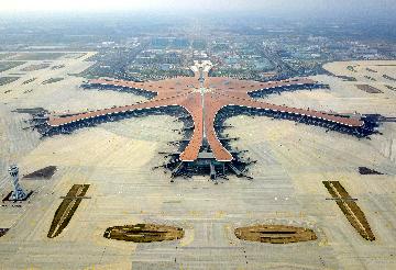 Beijings new airport opens to flights