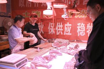 Chinas pork prices continue to retreat