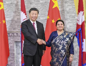 Xis trip boosts ties with India and Nepal, promotes regional cooperation