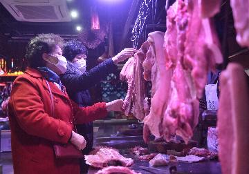 Chinas pork prices dip last week