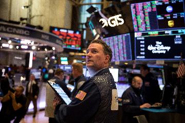 Wall Street tumbles amid tech rout