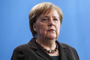 Merkel backs WHO, intl cooperation in fighting