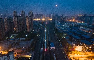 Wuhan lifts outbound travel restrictions, ending months-long lockdown