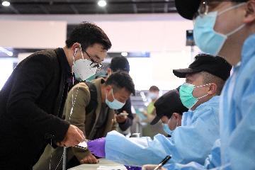 中国加强对无症状感染者的发现、报告和管理
