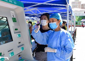 China mulls adding coronavirus-related medicines to medical insurance list