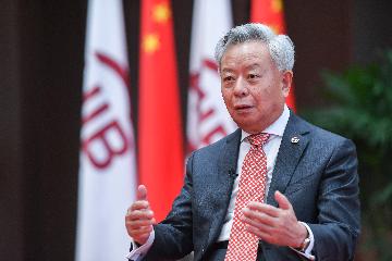 Jin Liqun reelected president of AIIB