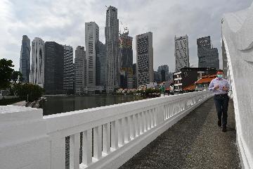 Hong Kong, Singapore reach in-principle agreement