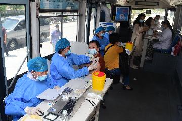 美媒:中国加快疫苗接种有望加速亚洲经济复苏