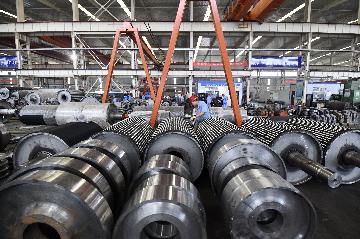 Chinas industrial profits surge 44.7 pct in first nine months