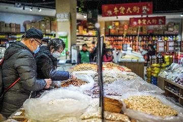 Chinas inflation moderates in January, tempered by food prices